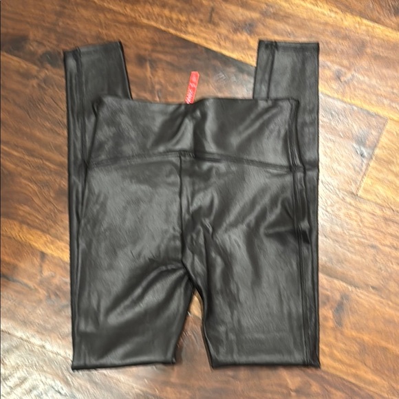SPANX Black Faux Leather Leggings with a sleek form-fitting design - Picture 5 of 5